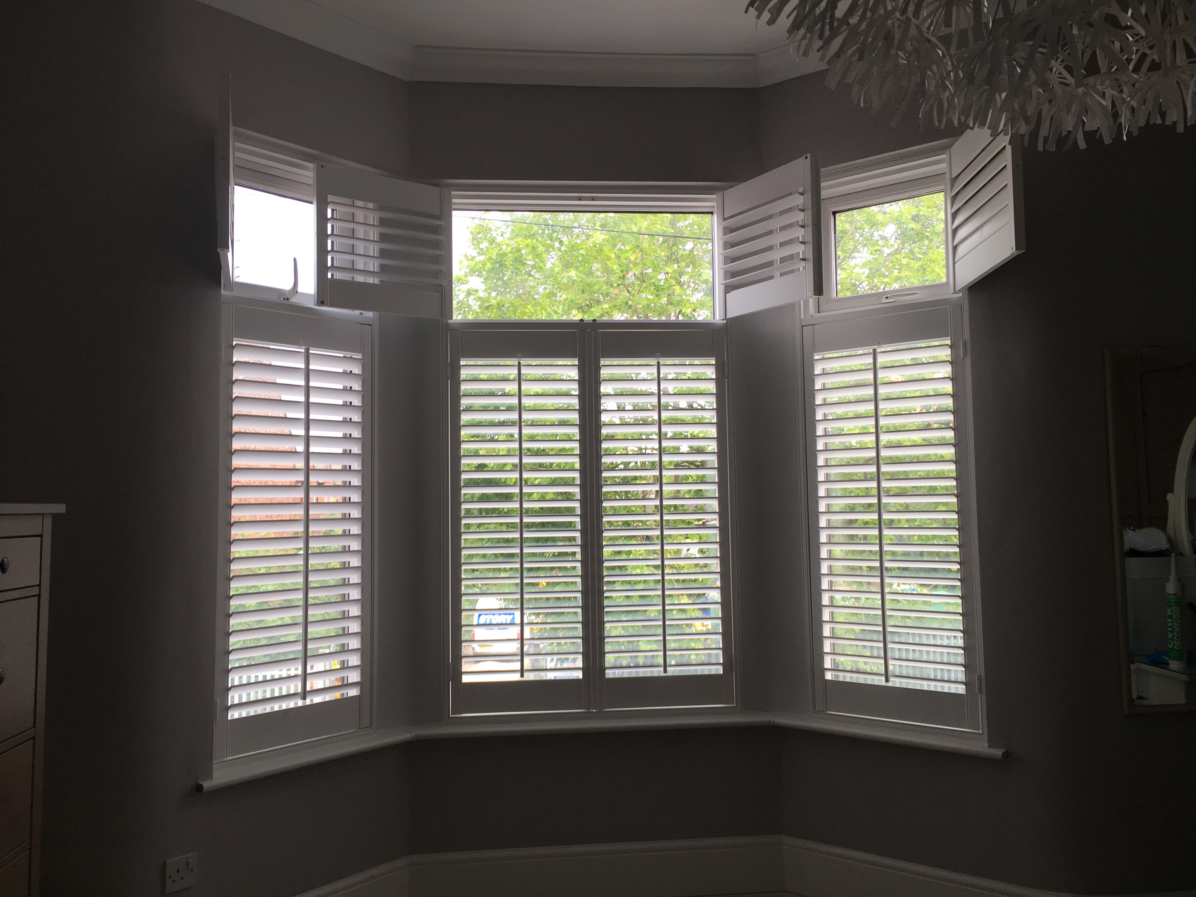 A TierOnTier 3 Sided Bay Window Installation with classic Push Rods